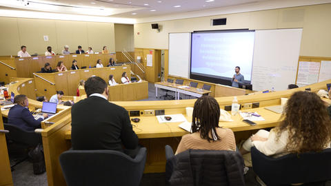 Classroom with progam participants and speaker at front