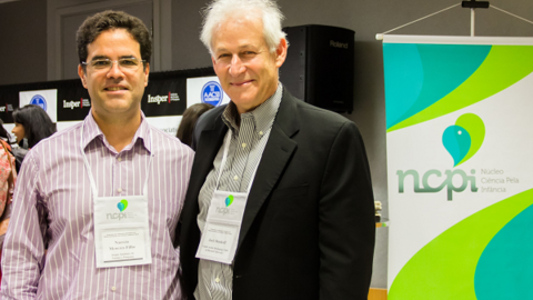 faculty member and Brazilian collaborator at early childhood event