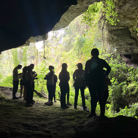 Students in a cave