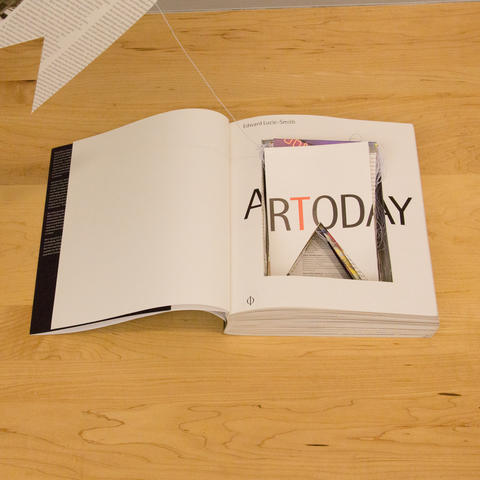 Through the surface of the page