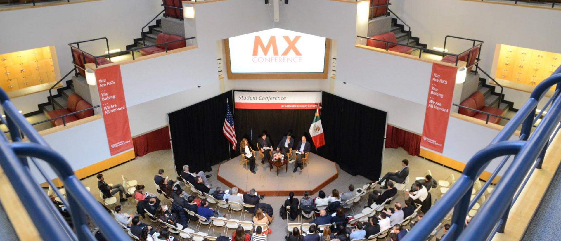 Image of students in a conference.