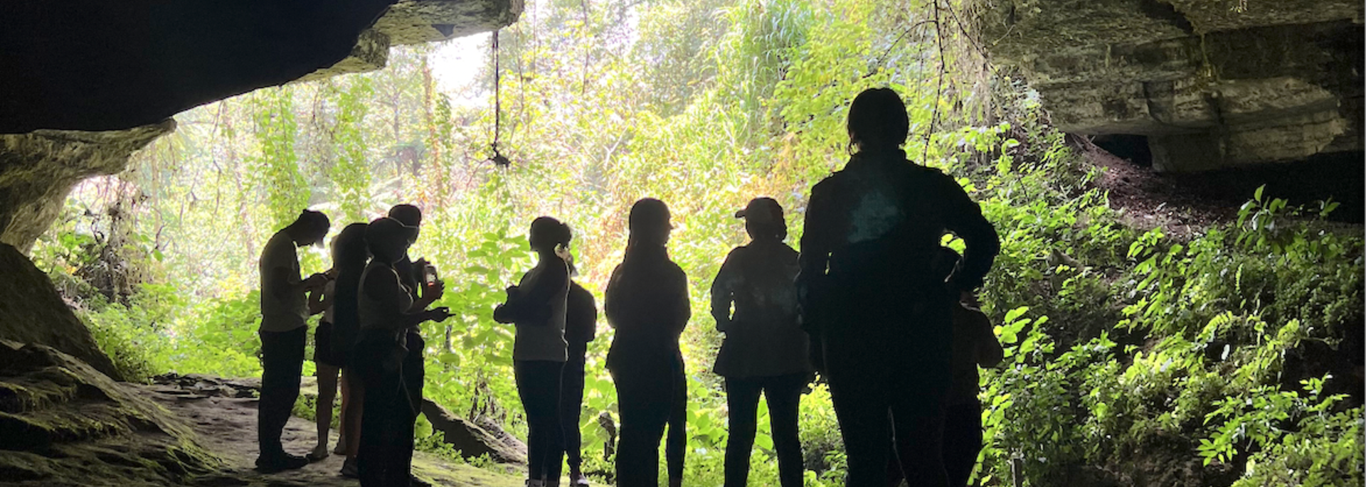 Students in a cave