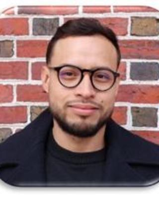 headshot of Alfredo Garcia Garza