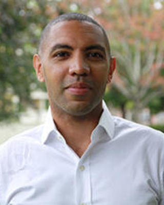 headshot of Emmerich Davies