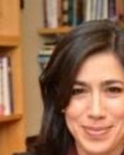 maria_luisa_at_desk_1_0.jpg