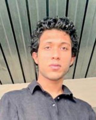 headshot of Rishab Nandi