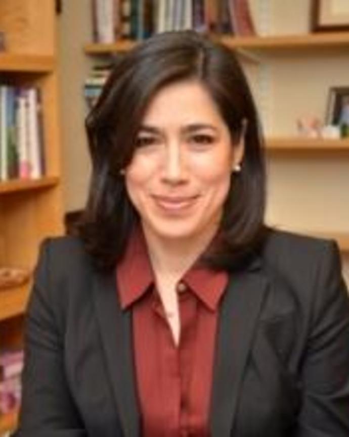 maria_luisa_at_desk_1_0.jpg